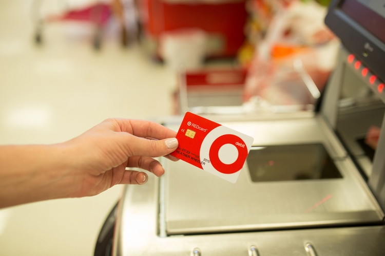 Can customers pay their REDcard credit card balance at a Target store?
